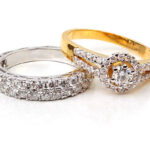 Golden diamond ring and contemporary diamond, isolated on white background