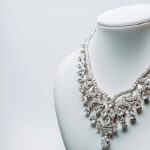 pngtree-beautiful-and-luxury-necklace-with-jewelry-stand-neck-on-white-background-image_15936724